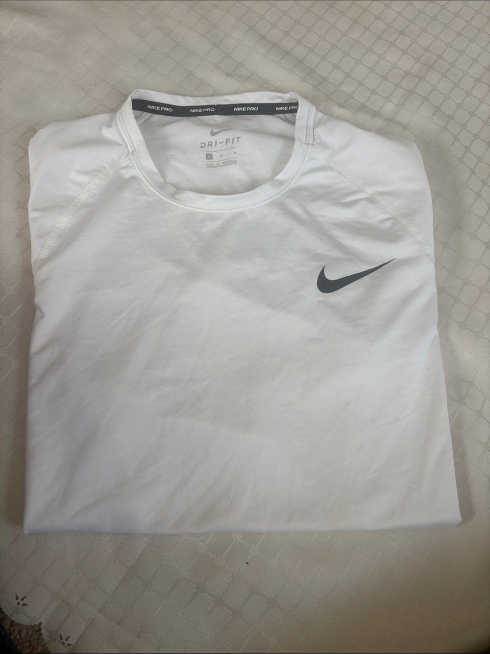 Nike White Short Sleeve Performance Tee with Black Swoosh